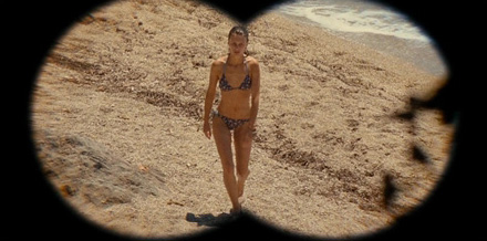 Brother through binoculars peeping on naked sister on the beach (MI0236)