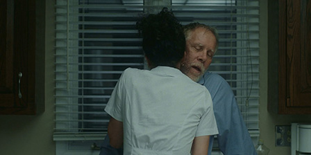 Young nurse is jerking off an old man